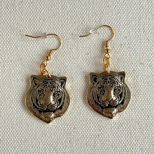 Gold tiger face earrings